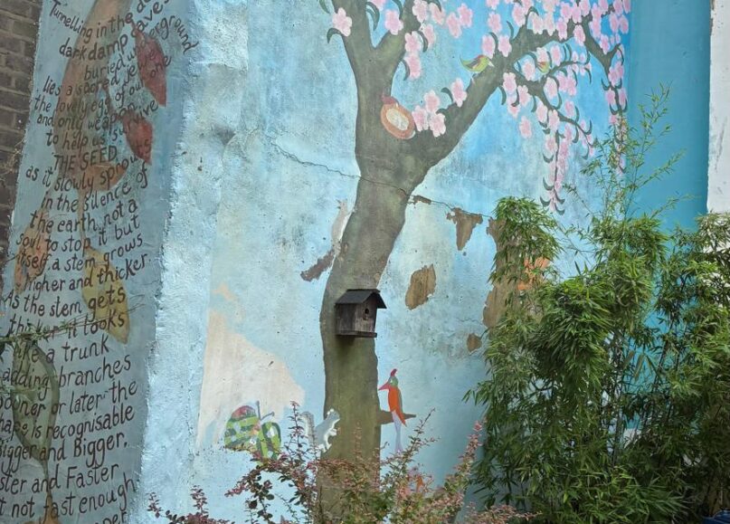 Refreshing the Mural at Poets’ Corner Community Garden